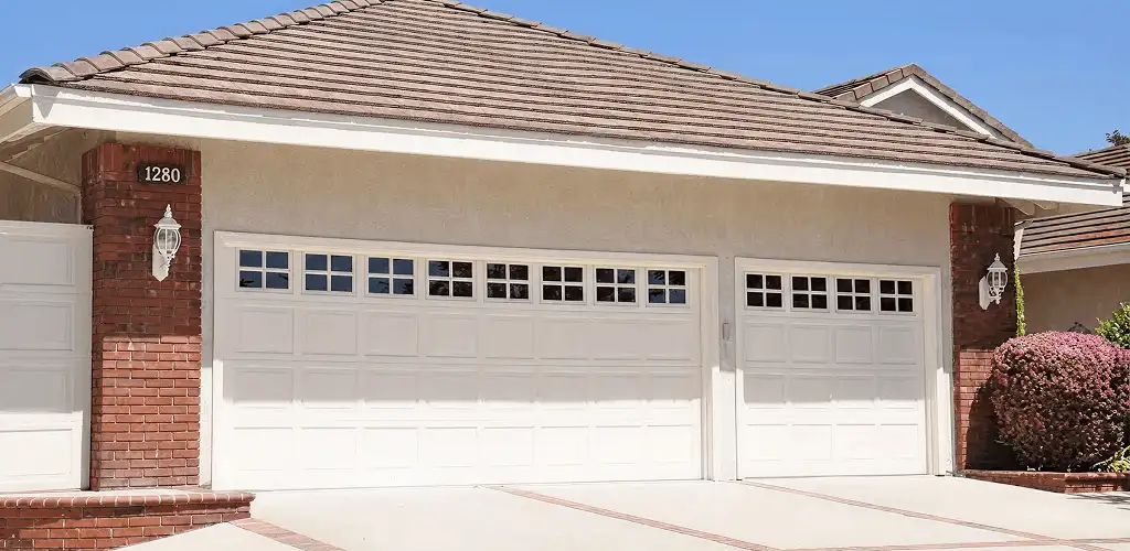Residential garage door repair service for a double garage door in Dover, DE