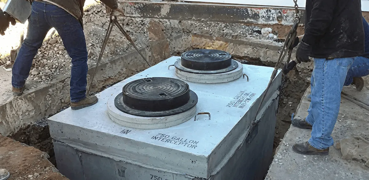 Grease trap installation for a commercial property drainage system in Dover, DE