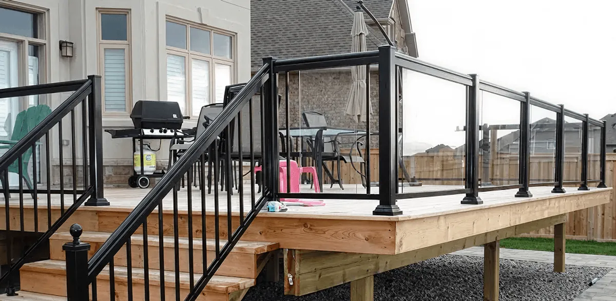 Handrail installation on a deck staircase for safety and code compliance in Dover, DE