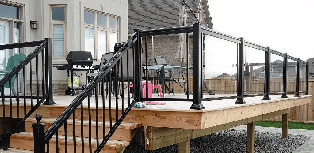 Handrail installation on a deck staircase for safety and code compliance in Dover, DE