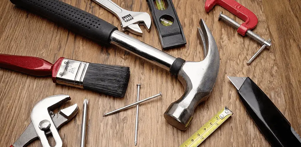 Handyman tools laid out for home repair and maintenance work in Dover, DE